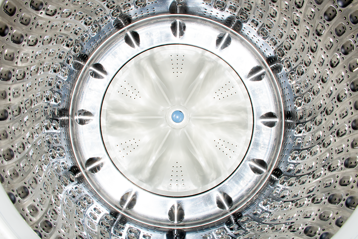 Image of the inside of a washing machine from the top.